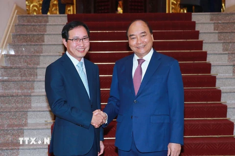 Thủ tướng Nguyễn Xuân Phúc tiếp ông Choi Joo Ho, Tổng giám đốc Tổ hợp Samsung Việt Nam ngày 14/6. (Ảnh: Thống Nhất/TTXVN)