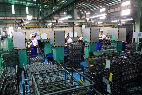 Dây chuyền sản xuất phanh của Công ty Sản xuất phanh Nissin Việt Nam, vốn đầu tư của Nhật Bản tại Vĩnh Phúc. (Ảnh minh họa: Danh Lam/TTXVN)