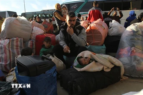 Người tị nạn Syria trở về từ Liban ngày 3/12/2019. (Ảnh: THX/ TTXVN)