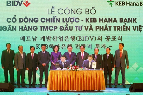 Lễ ký kết thỏa thuận giữa Ngân hàng TMCP Đầu tư và Phát triển Việt Nam (BIDV) Ngân hàng KEB Hana Hàn Quốc (KEB Hana Bank). (Ảnh: Nguyễn Dân/TTXVN)