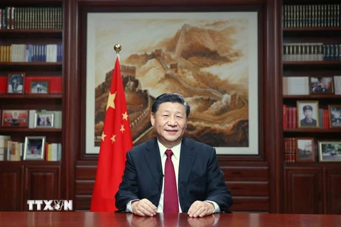 Chủ tịch Trung Quốc Tập Cận Bình đọc thông điệp chúc mừng năm mới 2020 tại Bắc Kinh. (Ảnh: THX/TTXVN)