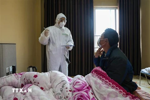Bệnh nhân nhiễm virus corona chủng mới được điều trị tại bệnh viện ở Vũ Hán, tỉnh Hồ Bắc, Trung Quốc, ngày 3/2/2020. (Ảnh: AFP/ TTXVN)