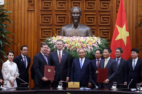 Thủ tướng Nguyễn Xuân Phúc tiếp đoàn doanh nghiệp Hoa Kỳ là thành viên Hội đồng kinh doanh Hoa Kỳ-ASEAN (USABC). (Ảnh: Thống Nhất - TTXVN)
