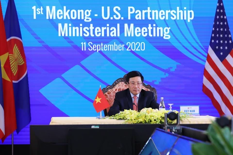 Phó Thủ tướng, Bộ trưởng Ngoại giao Phạm Bình Minh chủ trì Hội nghị Bộ trưởng Quan hệ đối tác Mekong-Mỹ lần thứ nhất. (Ảnh: Lâm Khánh/TTXVN)