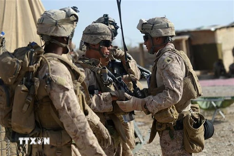 Binh sỹ Mỹ tuần tra tại khu vực Sangin, Afghanistan, ngày 12/6/2012. (Ảnh: AFP/TTXVN)