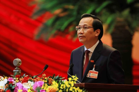 Đồng chí Đào Ngọc Dung, Ủy viên Trung ương Đảng, Bộ trưởng Bộ Lao động-Thương binh và Xã hội trình bày tham luận. (Ảnh: TTXVN)