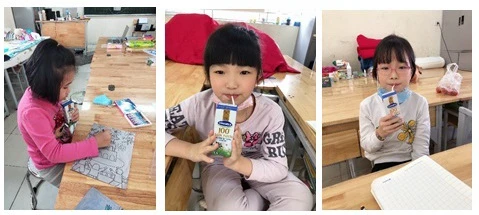 Những hộp sữa đã đến với các em học sinh tại trường Xuân Phương. Mỗi bé sẽ được bổ sung 2 hộp sữa mỗi ngày. (Nguồn: Vietnam+)
