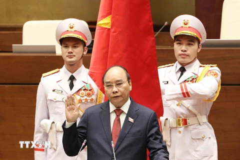 Chủ tịch nước Nguyễn Xuân Phúc tuyên thệ nhậm chức. (Ảnh: Phương Hoa/TTXVN)