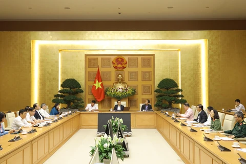 Phó Thủ tướng Vũ Ðức Ðam chủ trì cuộc họp. (Ảnh: Văn Điệp/TTXVN)