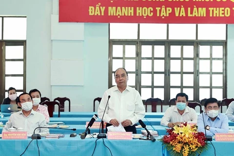 Chủ tịch nước Nguyễn Xuân Phúc phát biểu tại buổi làm việc với các huyện Củ Chi và Hóc Môn ngày 6/5. (Ảnh: Thống Nhất/TTXVN)
