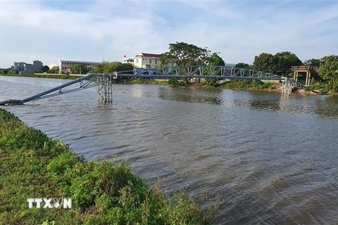 Con sông tại xã Nam Tiến, huyện Nam Trực, Nam Định nơi một học sinh lớp 12 trường THPT Nguyễn Du bị đuối nước. (Ảnh: Công Luật/TTXVN)