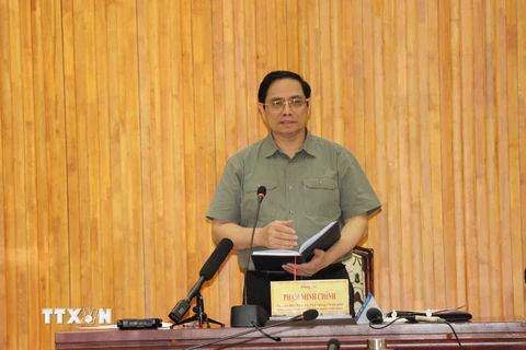 Thủ tướng Chính phủ Phạm Minh Chính phát biểu kết luận tại buổi làm việc. (Ảnh: Lê Đức Hoảnh/TTXVN)