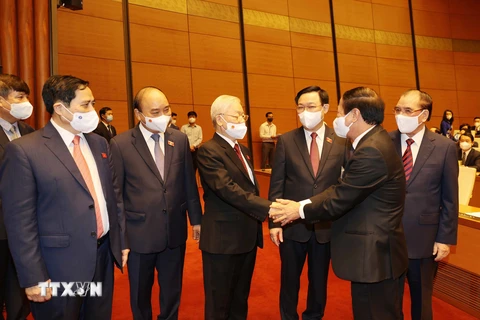 Tổng Bí thư Nguyễn Phú Trọng với các đồng chí lãnh đạo Đảng, Nhà nước tại Lễ khai mạc. (Ảnh: Trí Dũng/TTXVN)