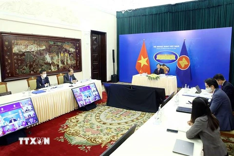 Bộ trưởng Bộ Ngoại giao Bùi Thanh Sơn tham dự Hội nghị Ủy ban khu vực Đông Nam Á không có vũ khí hạt nhân (SEANWFZ) theo hình thức trực tuyến. (Ảnh: Phạm Kiên/TTXVN)