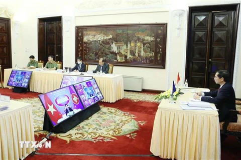 Bộ trưởng Bộ Ngoại giao Bùi Thanh Sơn tham dự Hội nghị Cộng đồng Chính trị-An ninh ASEAN (APSC) lần thứ 23 theo hình thức trực tuyến. (Ảnh: Phạm Kiên/TTXVN)