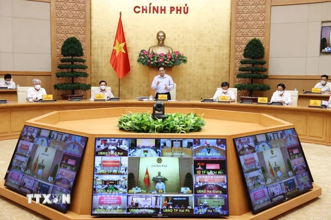 Thủ tướng Phạm Minh Chính, Trưởng Ban Chỉ đạo chủ trì buổi làm việc trực tuyến với các địa phương và 9.043 xã, phường, thị trấn trên cả nước. (Ảnh: Dương Giang/TTXVN)