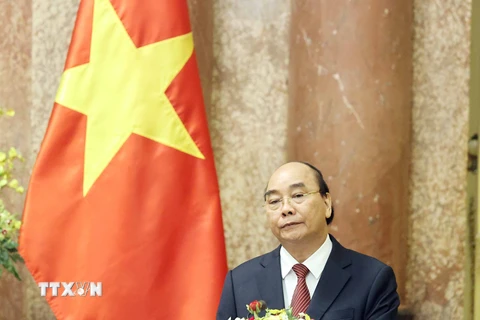Chủ tịch nước Nguyễn Xuân Phúc phát biểu tại lễ trao quyết định. (Ảnh: Thống Nhất/TTXVN)