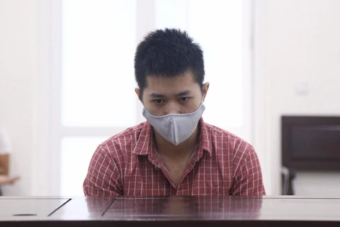 Phạm Thanh Tùng tại phiên tòa. (Nguồn: nld.vn) 