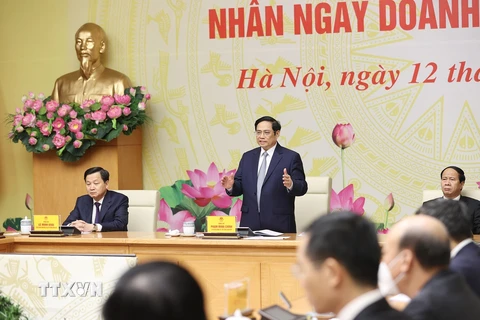 Thủ tướng Phạm Minh Chính phát biểu tại buổi gặp đại diện các doanh nghiệp, doanh nhân tiêu biểu. (Ảnh: Dương Giang/TTXVN)