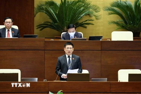 Bộ trưởng Bộ Tài chính Hồ Đức Phớc phát biểu giải trình, làm rõ một số vấn đề đại biểu Quốc hội nêu. (Ảnh: Phạm Kiên/TTXVN)