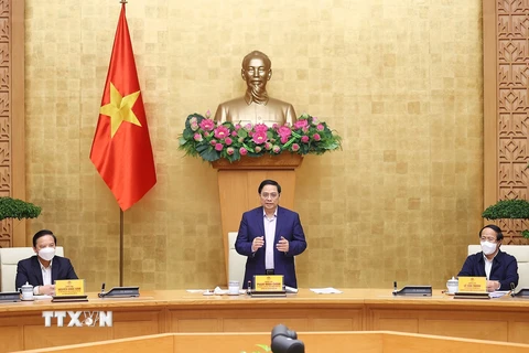 Thủ tướng Phạm Minh Chính chủ trì họp Ban Chỉ đạo Quốc gia phòng, chống dịch COVID-19 với các tỉnh, thành phố. (Ảnh: Dương Giang/TTXVN)