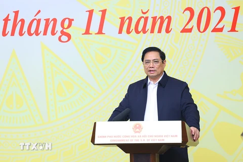 Thủ tướng Phạm Minh Chính, Chủ tịch Ủy ban Quốc gia về Chuyển đổi số phát biểu khai mạc. (Ảnh: Dương Giang/TTXVN)