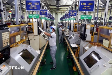 Công ty TNHH Nidec Tosok Việt Nam của nhà đầu tư Nhật Bản sản xuất các chi tiết cơ khi tại khu chế xuất Tân Thuận (Thành phố Hồ Chí Minh). (Ảnh: Danh Lam/TTXVN)