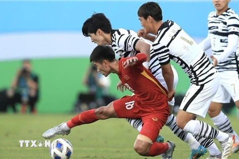 Đội tuyển U23 Việt Nam xuất sắc cầm hòa đội tuyển U23 Hàn Quốc với tỷ số 1-1. (Ảnh: TTXVN phát)