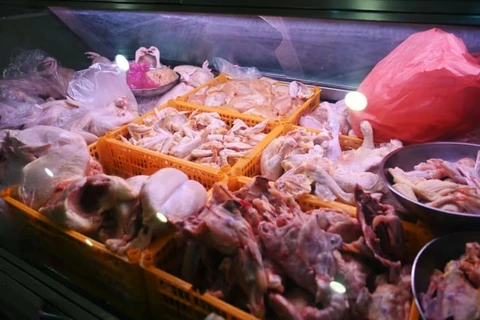 Thịt gà bày bán tại chợ Tiong Bahru, Singapore. (Nguồn: CNA)