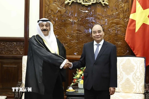 Chủ tịch nước Nguyễn Xuân Phúc tiếp Đại sứ Kuwait Yousef Ashour Al-sabbagh. (Ảnh: Thống Nhất/TTXVN)