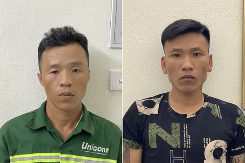 Hai nghi phạm Nguyễn Văn Kiên và Lê Phú Giáp tại cơ quan công an. (Nguồn: tuoitre.vn)