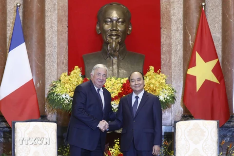 Chủ tịch nước Nguyễn Xuân Phúc tiếp Chủ tịch Thượng viện Cộng hòa Pháp Gérard Larcher. (Ảnh: An Đăng/TTXVN)