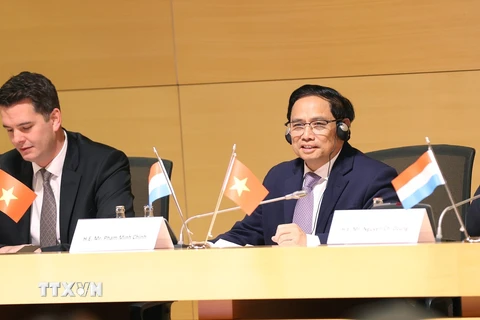 Thủ tướng Phạm Minh Chính dự Diễn đàn doanh nghiệp Việt Nam-Luxembourg. (Ảnh: Dương Giang/TTXVN)