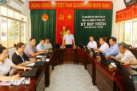 Quang cảnh Kỳ họp lần thứ 34 của Ủy ban Kiểm tra Tỉnh ủy Gia Lai xem xét kỷ luật nhiều lãnh đạo của Sở Tài nguyên và Môi trường tỉnh Gia Lai. (Ảnh: Đăng Vũ-Quang Thái/TTXVN)