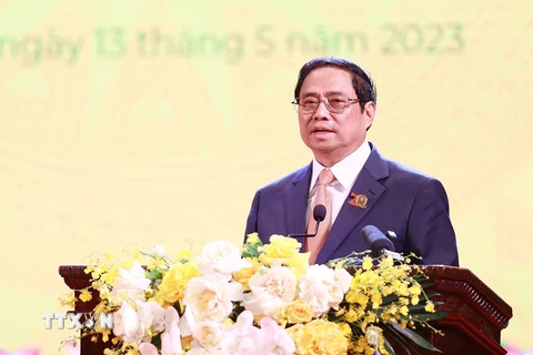 Thủ tướng Phạm Minh Chính phát biểu tại Lễ Kỷ niệm 70 năm Ngày Truyền thống Lực lượng An ninh kinh tế. (Ảnh: Dương Giang/TTXVN)