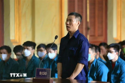Bị cáo chủ mưu Hoàng Duy Tiến, cựu cán bộ Phòng Cảnh sát Kinh tế, Công an Thành phố Hồ Chí Minh. (Ảnh: Thành Chung/TTXVN)