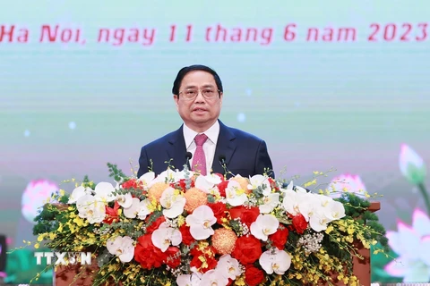Thủ tướng Phạm Minh Chính phát biểu tại Hội nghị biểu dương, tôn vinh điển hình tiên tiến toàn quốc. (Ảnh: Dương Giang/TTXVN)