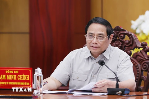 Thủ tướng Phạm Minh Chính chủ trì làm việc với lãnh đạo chủ chốt tỉnh Long An. (Ảnh: Dương Giang/TTXVN)