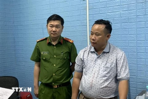 Đối tượng Nguyễn Văn Minh tại cơ quan điều tra. (Ảnh: TTXVN phát)