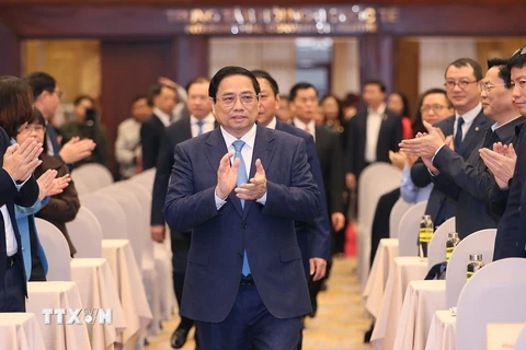 Thủ tướng Phạm Minh Chính đến dự hội nghị. (Ảnh: Dương Giang/TTXVN)
