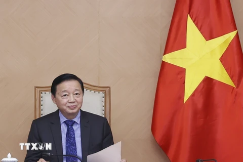 Phó Thủ tướng Trần Hồng Hà điện đàm với Phó Thủ tướng Nga Alexander Novak. (Ảnh: Văn Điệp/TTXVN)
