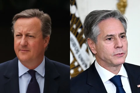 Ngoại trưởng Anh David Cameron và người đồng cấp Mỹ Antony J. Blinken. (Nguồn: AFP/TTXVN)
