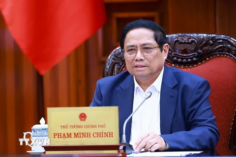 Thủ tướng Phạm Minh Chính chủ trì cuộc họp về chính sách tài khóa. (Ảnh: Dương Giang/TTXVN)
