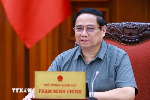 Thủ tướng Phạm Minh Chính chủ trì cuộc họp giữa Thường trực Chính phủ với Thường trực Tiểu ban Kinh tế-Xã hội. (Ảnh: Dương Giang/TTXVN)