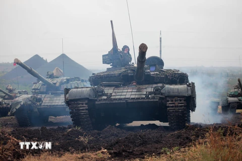 Tay súng l​y khai làm nhiệm vụ trong một chiến dịch quân sự ở thị trấn Torez thuộc khu vực Donetsk ngày 14/9. (Nguồn: AFP/TTXVN) 