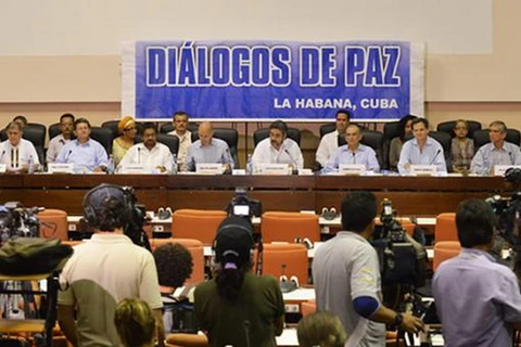 Colombia lạc quan với quyết định ngừng không kích vào FARC