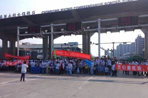 Công nhân nhà máy sản xuất iPhone 6 biểu tình đòi tăng lương