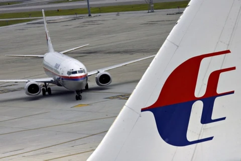 Máy bay Malaysia Airlines quay đầu do hành khách say rượu