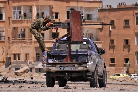 Một chiến binh người Kurd chiến đấu tại Hasakeh. (Nguồn: AFP)