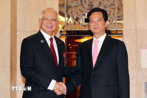  Thủ tướng Nguyễn Tấn Dũng và Thủ tướng Malaysia Najib Razak. (Ảnh: Đức Tám/TTXVN)